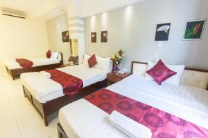 Postel nebo postele na pokoji v ubytování Ailen Garden 2 Hotel