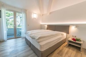Rúm í herbergi á Albergo Garni Francesco