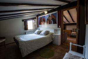 Łóżko lub łóżka w pokoju w obiekcie Casa Rural Andutza