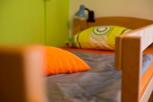 Postel nebo postele na pokoji v ubytování Guesthouse Adi
