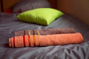 Postel nebo postele na pokoji v ubytování Guesthouse Adi