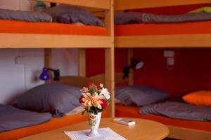 Postel nebo postele na pokoji v ubytování Guesthouse Adi