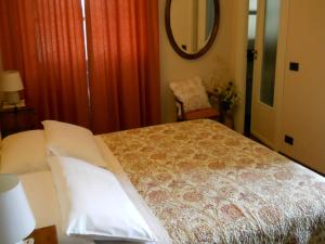 A bed or beds in a room at Tenuta Calabiana