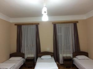 Letto o letti in una camera di Mari Guest House