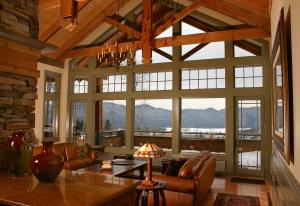 a living room with a couch and a table at The Mountain Top Inn & Resort in Chittenden +14 photos