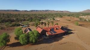 an aerial view of a house in the desert at Duwisib Guest Farm in Duwisib