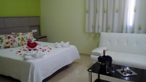 Postel nebo postele na pokoji v ubytování Hotel Primavera