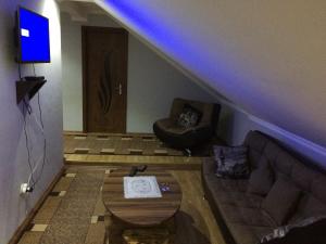 Area soggiorno di Mari Guest House