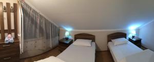 Letto o letti in una camera di Mari Guest House