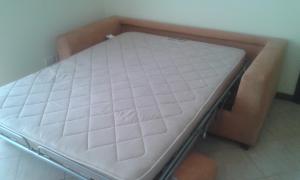 a mattress on a bed frame in a room at La Cornice del Garda in Cavalcaselle