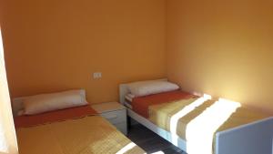 A bed or beds in a room at Villa Sofia
