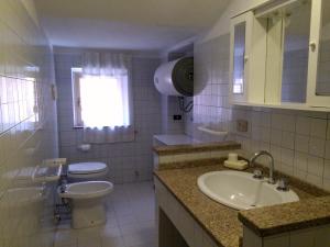 Kylpyhuone majoituspaikassa Corte Mannoni