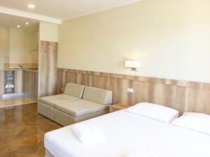 Postel nebo postele na pokoji v ubytování Villa Slavka