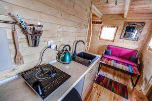 an overhead view of a kitchen in a tiny house at Dom Koprowo in Międzywodzie