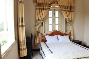 Katil atau katil-katil dalam bilik di Hoang Gia Doc Let