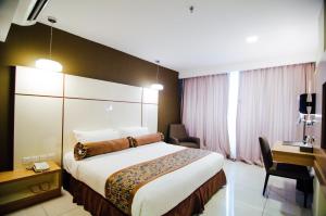 Llit o llits en una habitació de Hotel Sfera