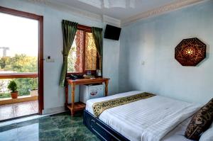 Letto o letti in una camera di RS II Guesthouse