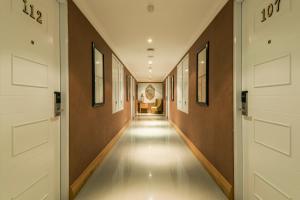 Fotografie z fotogalerie ubytování Yan's House Hotel v Kutě