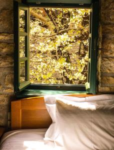 Posteľ alebo postele v izbe v ubytovaní Gaia Guesthouse