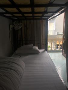 Katil atau katil-katil dalam bilik di Hanoi Ecogreen Hostel