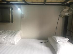 Katil atau katil-katil dalam bilik di Hanoi Ecogreen Hostel