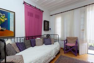 Postel nebo postele na pokoji v ubytování To Spitaki Apartments