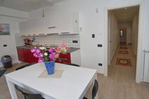 Кухня или мини-кухня в Appartamento Pettinato
