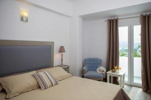 Letto o letti in una camera di Daedalus Hotel