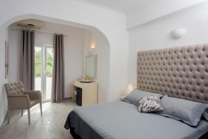 Letto o letti in una camera di Daedalus Hotel