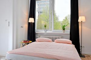 Posteľ alebo postele v izbe v ubytovaní Apartments City Center Warsaw by Noclegi Renters