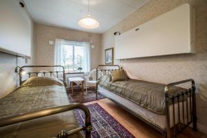 Letto o letti in una camera di Anna´s Bed & Kitchen