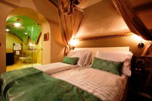 Postel nebo postele na pokoji v ubytování Hotel Actum