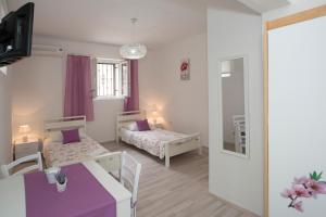 Posteľ alebo postele v izbe v ubytovaní Summer Bay Apartments