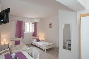 Posteľ alebo postele v izbe v ubytovaní Summer Bay Apartments