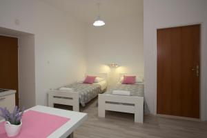 Posteľ alebo postele v izbe v ubytovaní Summer Bay Apartments