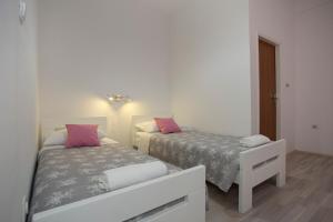 Posteľ alebo postele v izbe v ubytovaní Summer Bay Apartments