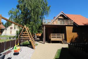 Herní místnost nebo prostor pro děti v ubytování Šeimos Vila