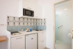 Kúpeľňa v ubytovaní Hermes Beach Front + 37 fotografií