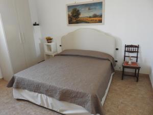 Postel nebo postele na pokoji v ubytování Masseria Prisuti