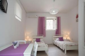 Posteľ alebo postele v izbe v ubytovaní Summer Bay Apartments