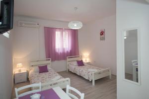 Posteľ alebo postele v izbe v ubytovaní Summer Bay Apartments