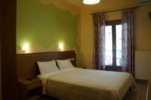 Postel nebo postele na pokoji v ubytování Guesthouse Papastathis