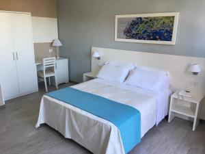 Posteľ alebo postele v izbe v ubytovaní Le Anfore Hotel - Lampedusa