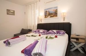 Łóżko lub łóżka w pokoju w obiekcie Guesthouse Aleto