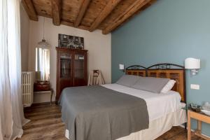 Letto o letti in una camera di CasaBiondani Lazise