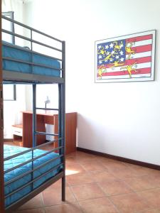 Postel nebo postele na pokoji v ubytování Vecchia Filanda Musso 1A