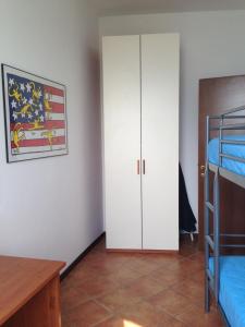 Postel nebo postele na pokoji v ubytování Vecchia Filanda Musso 1A