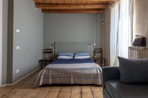 Letto o letti in una camera di CasaBiondani Lazise