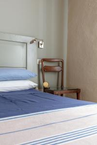 Letto o letti in una camera di CasaBiondani Lazise