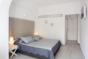 Letto o letti in una camera di Daedalus Hotel